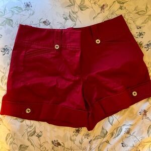 White House Black Market red dressy shorts with cuffed hem. Size 4
